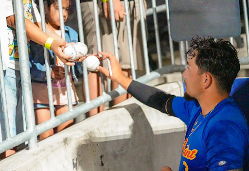 Kevin Saenz Jr training baseball players